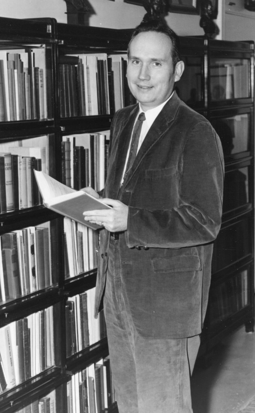 Wayne C. Temple posing in the Lincoln Room at Lincoln Memorial University in 1962.