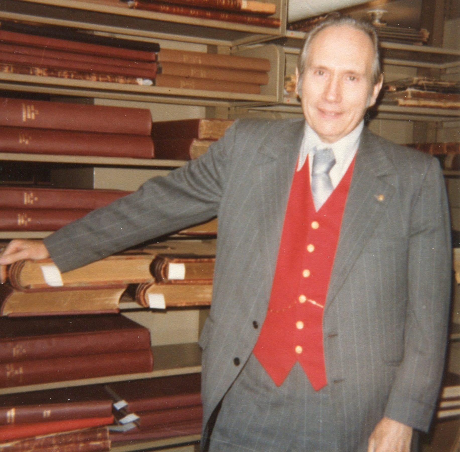 Wayne C. Temple posing in the Illinois State Archives.