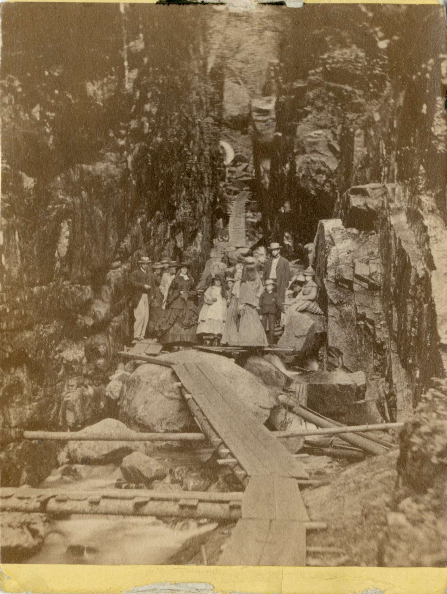  Photograph of a touring group, including Robert (far left), Tad (center), and Mary Todd Lincoln, at "the Flume," Franconia Notch, New Hampshire.