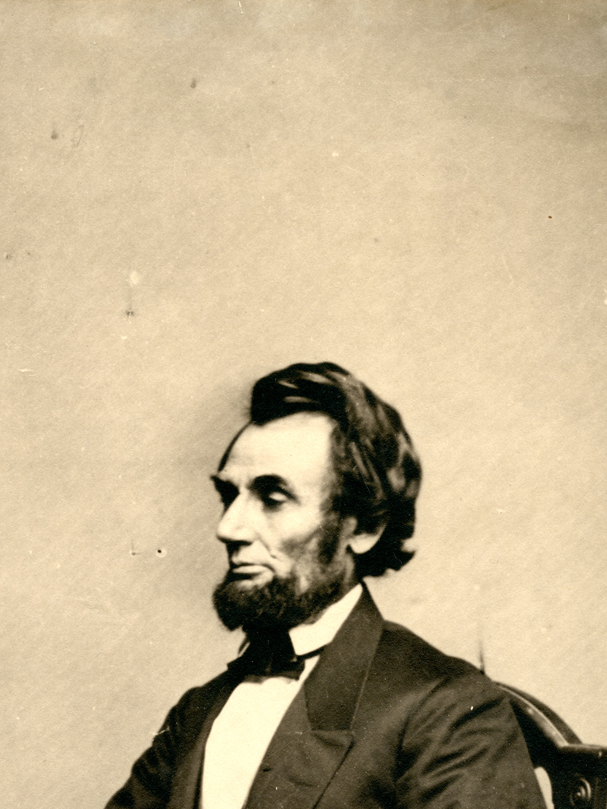 Lincoln sitting on chair